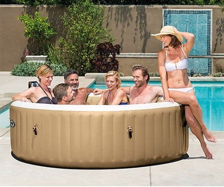 Whole family and friends having fun in a hot tub