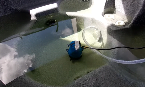 how to drain a hot tub with a submersible pump